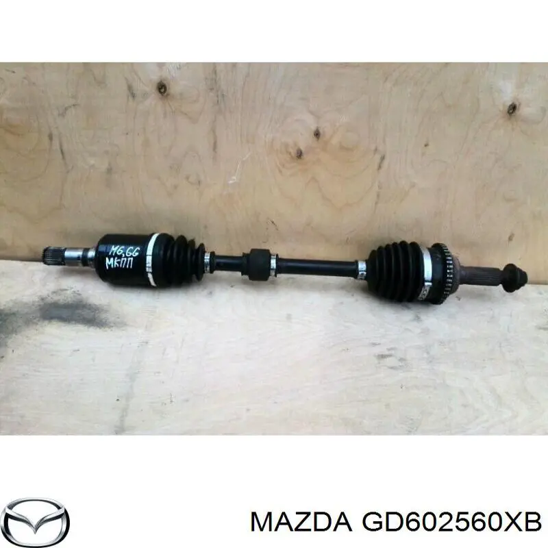 Купить GD602560XB Mazda Привод в сборе левый