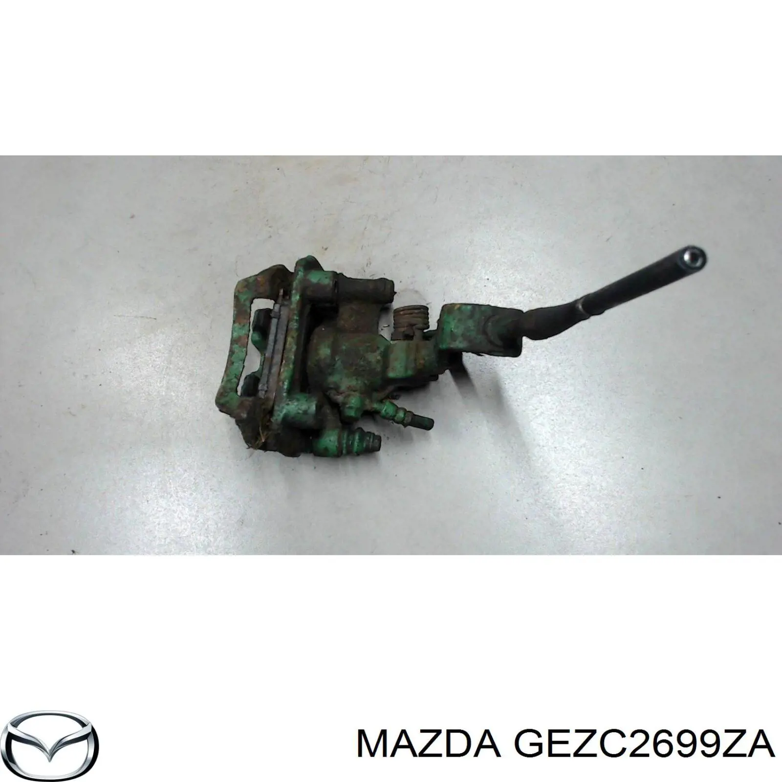 GEZC2699ZA Mazda суппорт тормозной задний левый