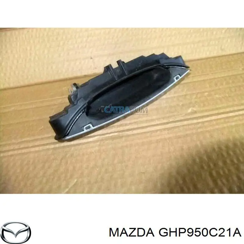 Заглушка (решетка) противотуманных фар бампера переднего левая Mazda GHP950C21A