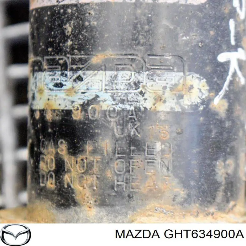 Купить GHT634900A Mazda Амортизатор подвески передний левый