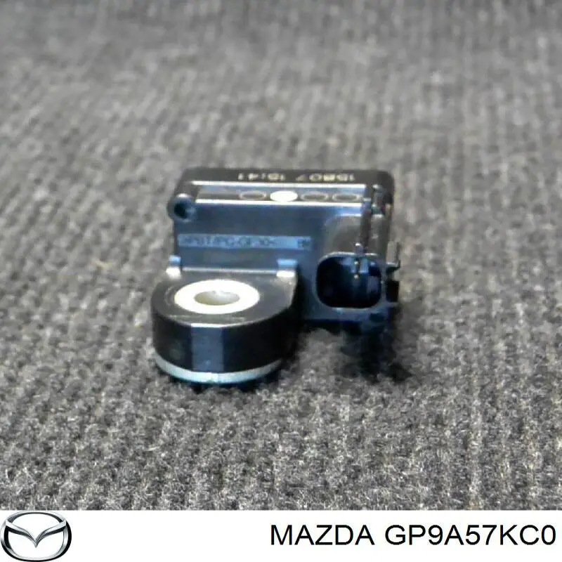 Датчик удара GP9A57KC0 Mazda