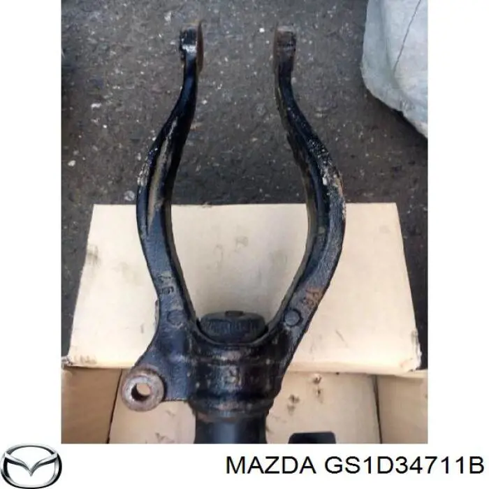 GS1D34711B Mazda forquilha inferior direita de amortecedor dianteiro