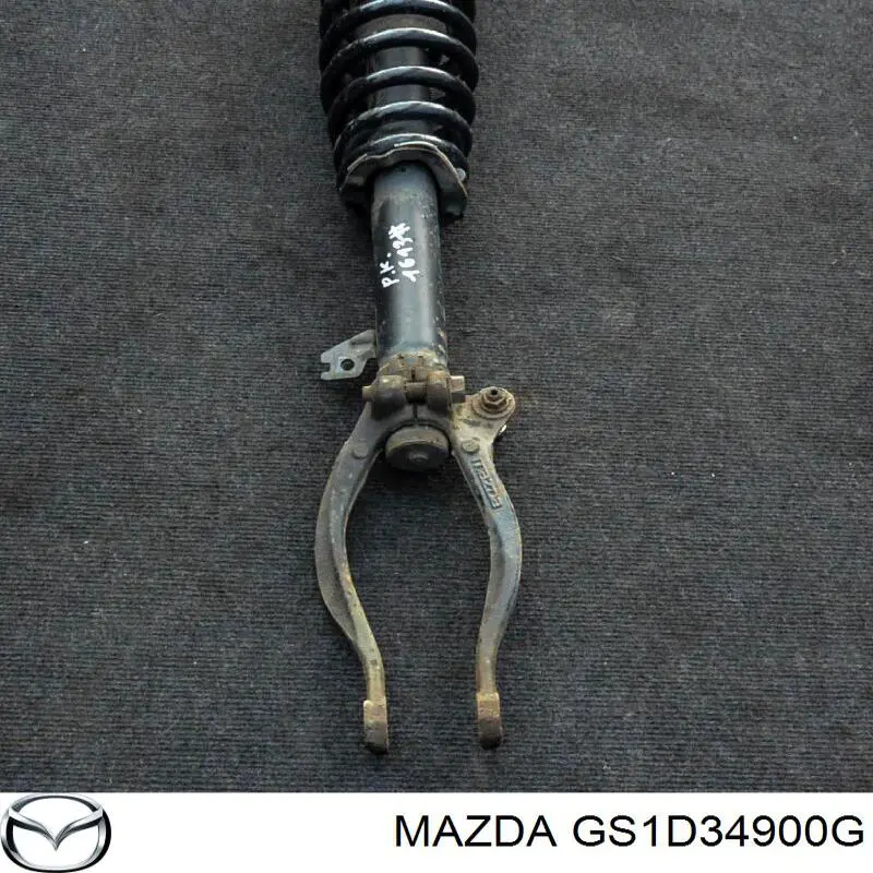 GS1D34900G Mazda Амортизатор передний левый