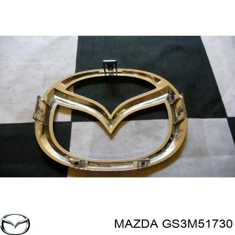 GS3M51730 Mazda эмблема решетки радиатора