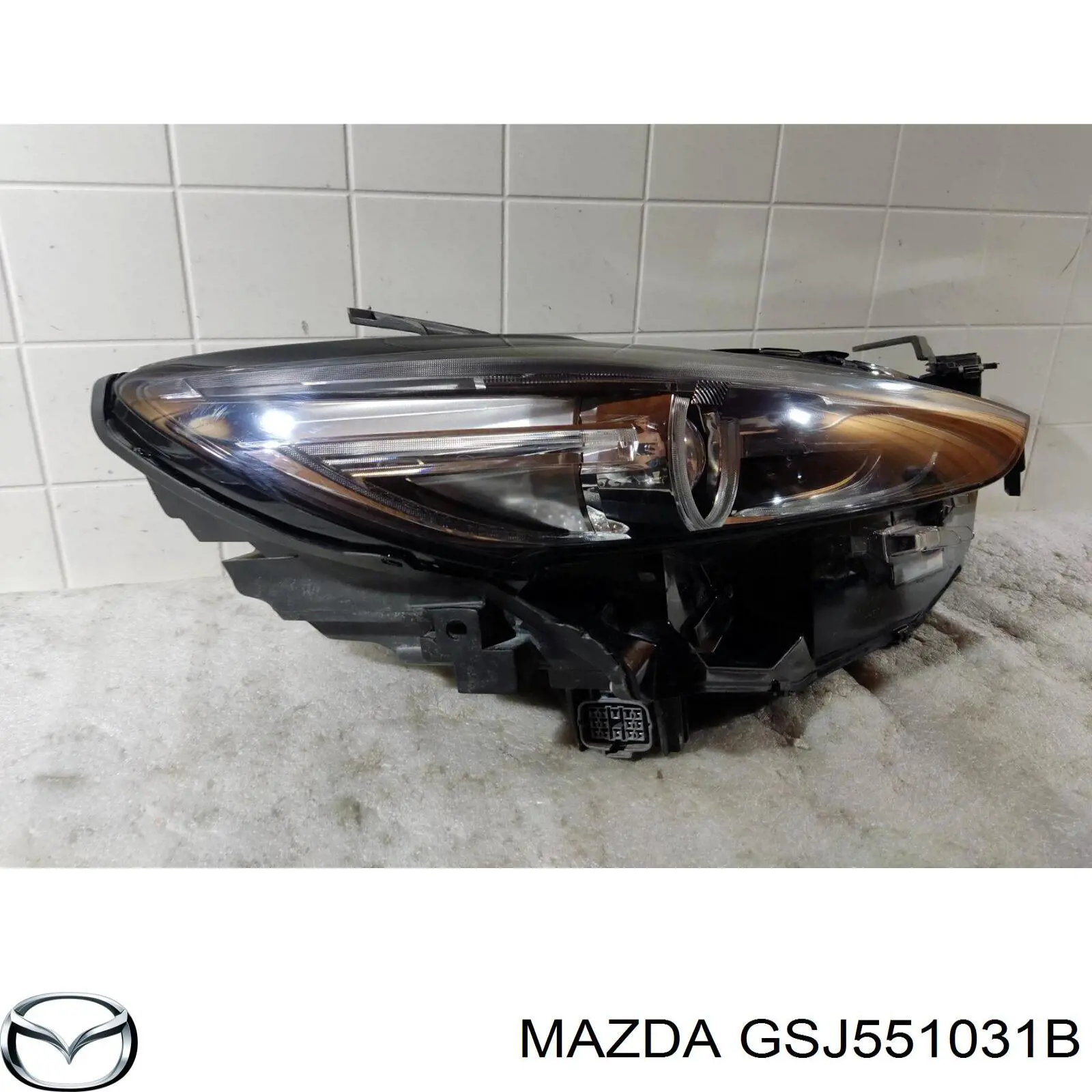 Купить GSJ551031B Mazda Фара основная правая