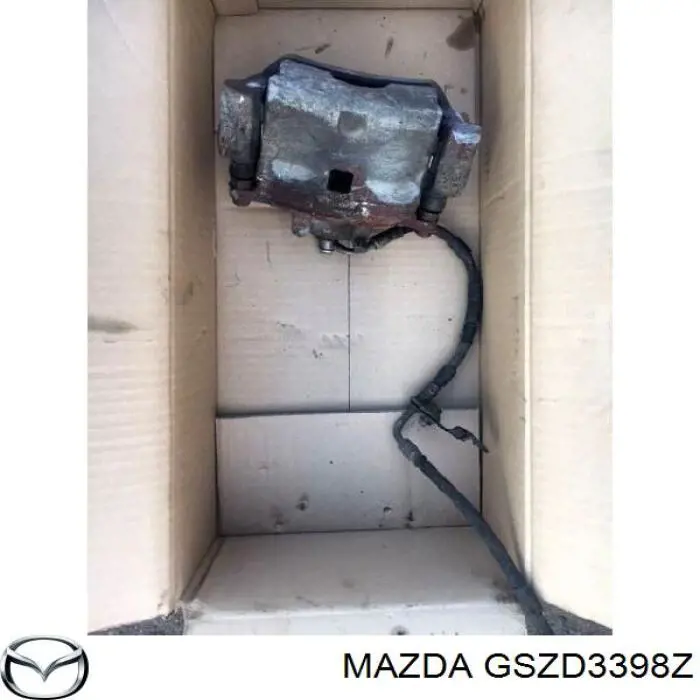 Купить GSZD3398Z Mazda Суппорт тормозной передний правый