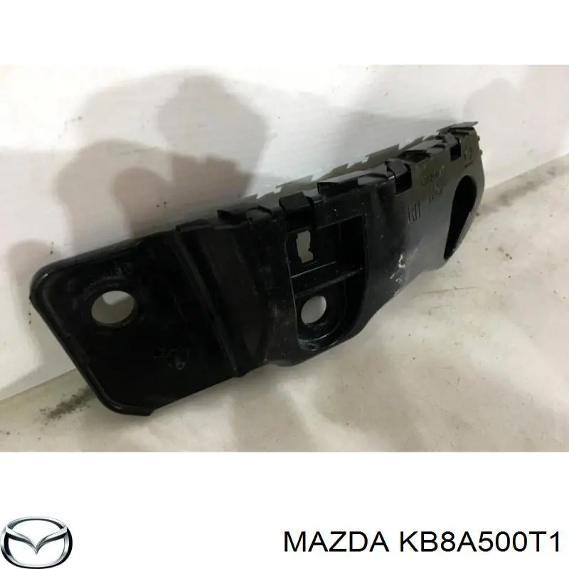 KB8A500T1 Mazda Кронштейн крепления бампера переднего правый