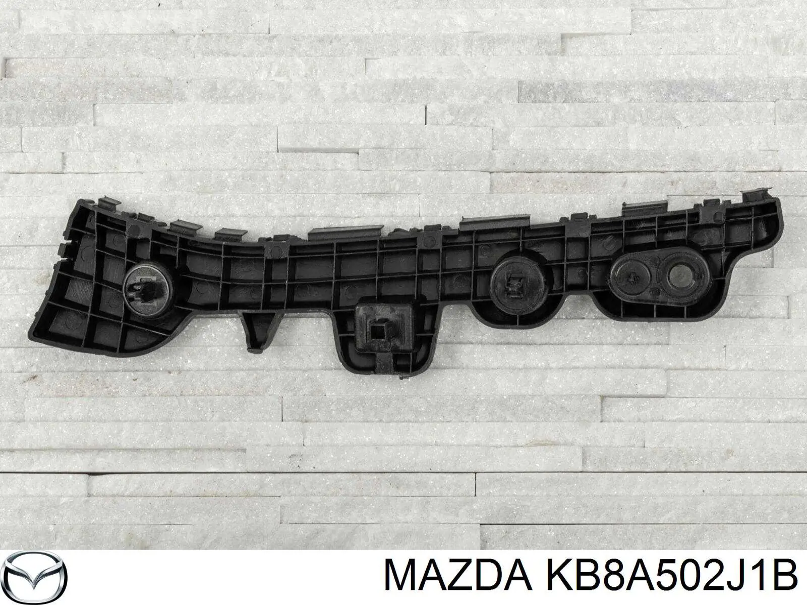 Guia esquerda do pára-choque traseiro KB8A502J1B Mazda