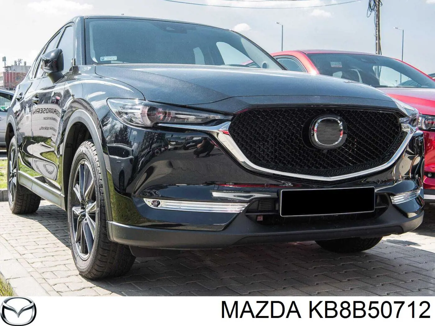 KB8B50712 Mazda Решетка радиатора