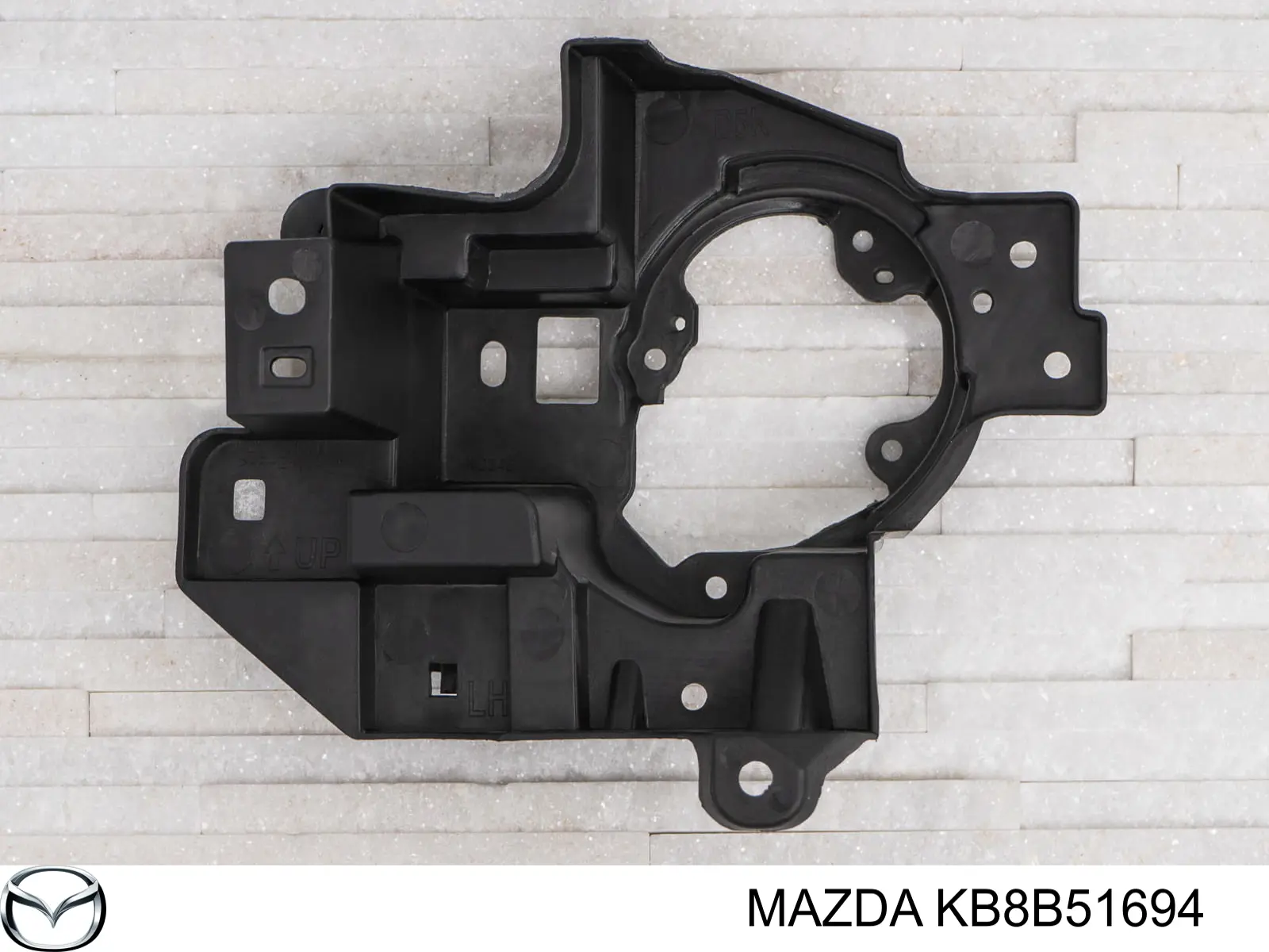 KB8B51694 Mazda consola de fixação das luzes de nevoeiro esquerdas