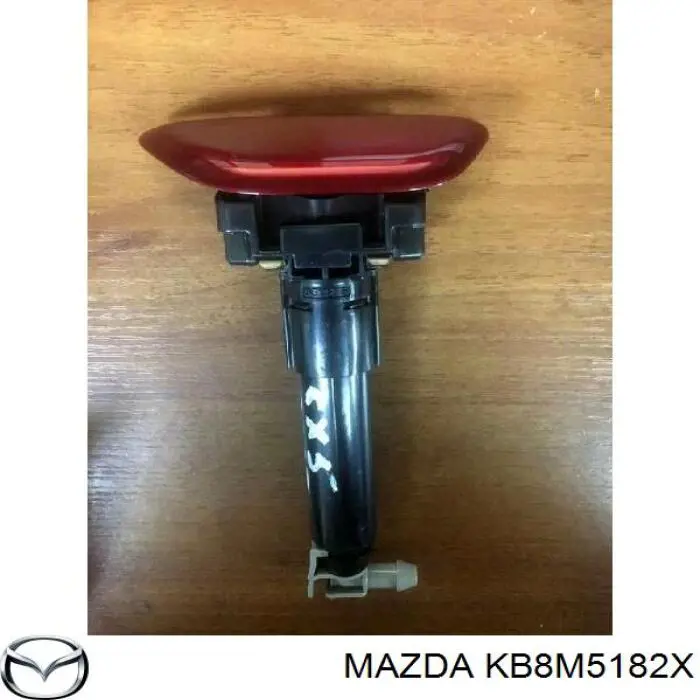 KB8M5182X Mazda Сопло омывателя фары передней, правой