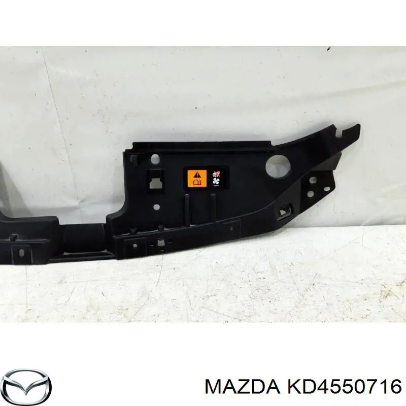 KD4550716 Mazda Накладка передней панели (суппорта радиатора) верхняя