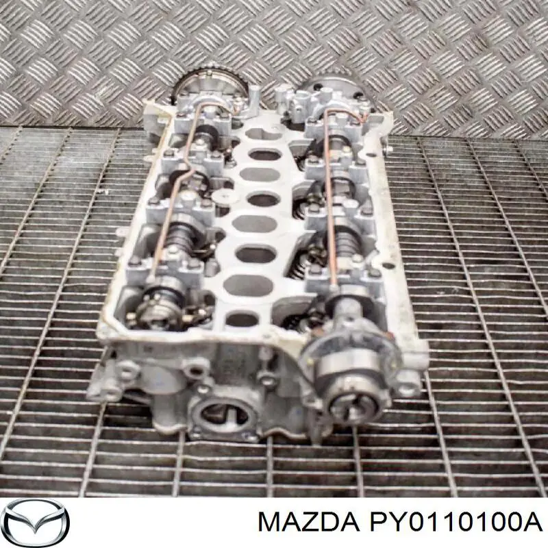 Купить PY0110100A Mazda ГБЦ  двигателя