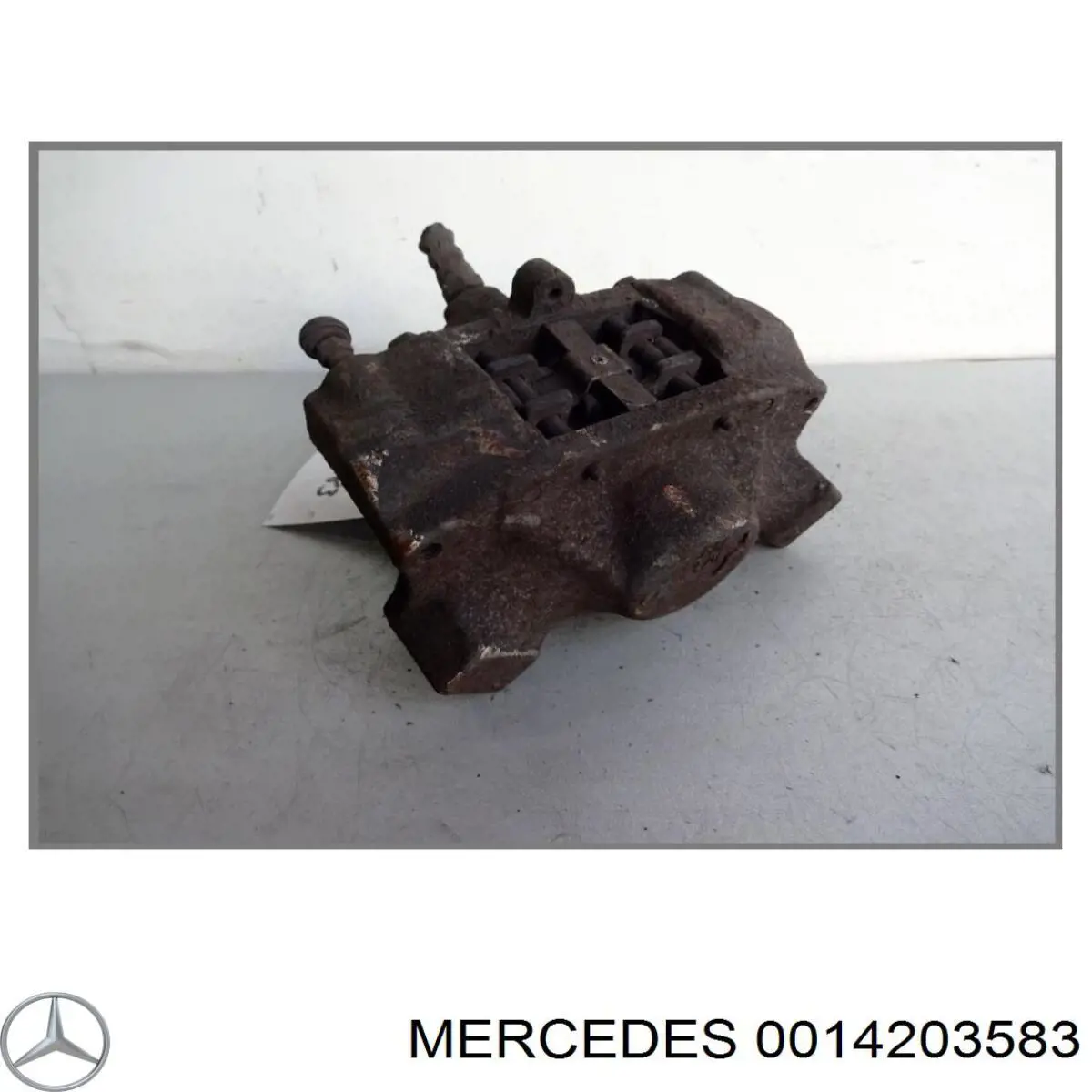0014203583 Mercedes суппорт тормозной задний левый