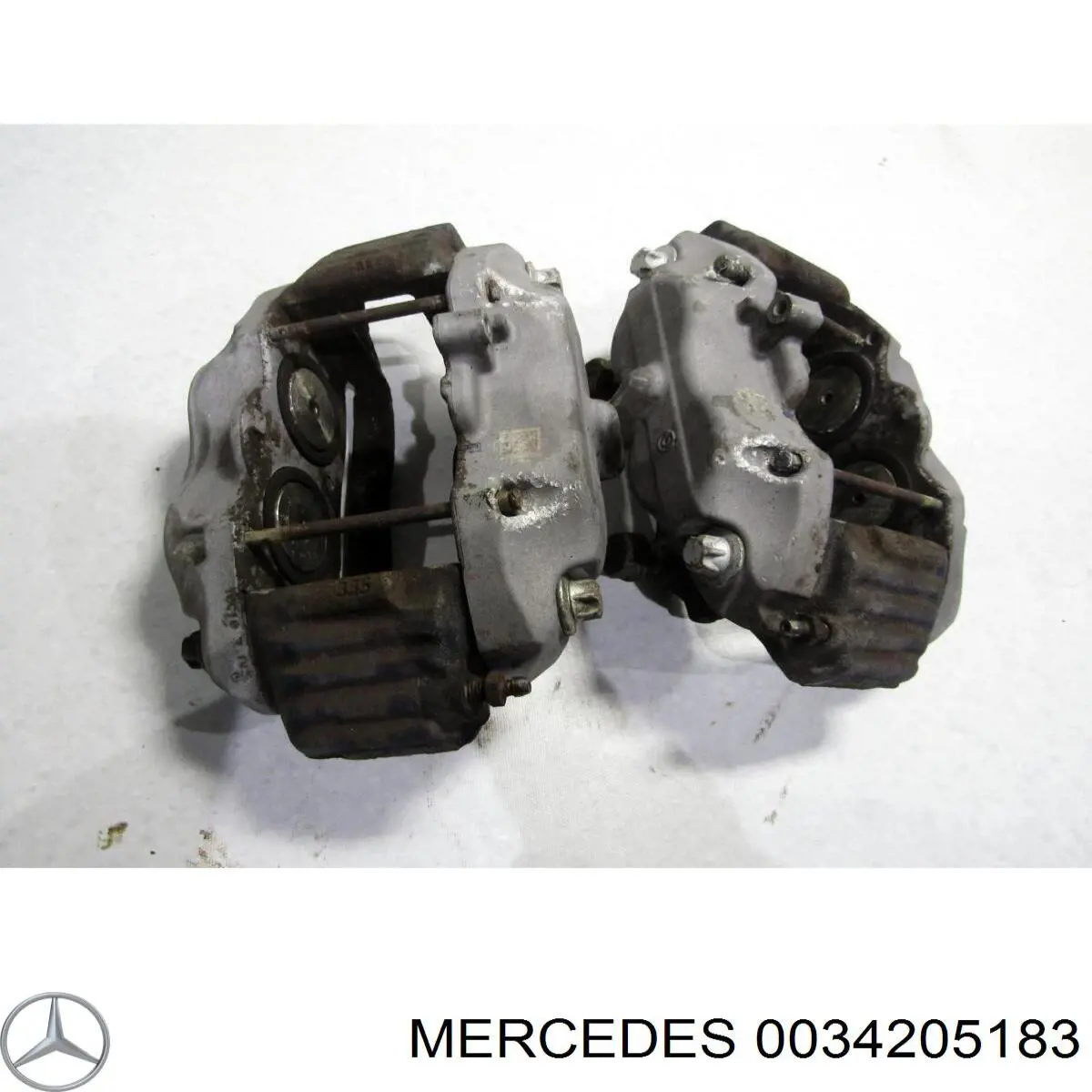 Купить 0034205183 Mercedes Суппорт тормозной передний левый