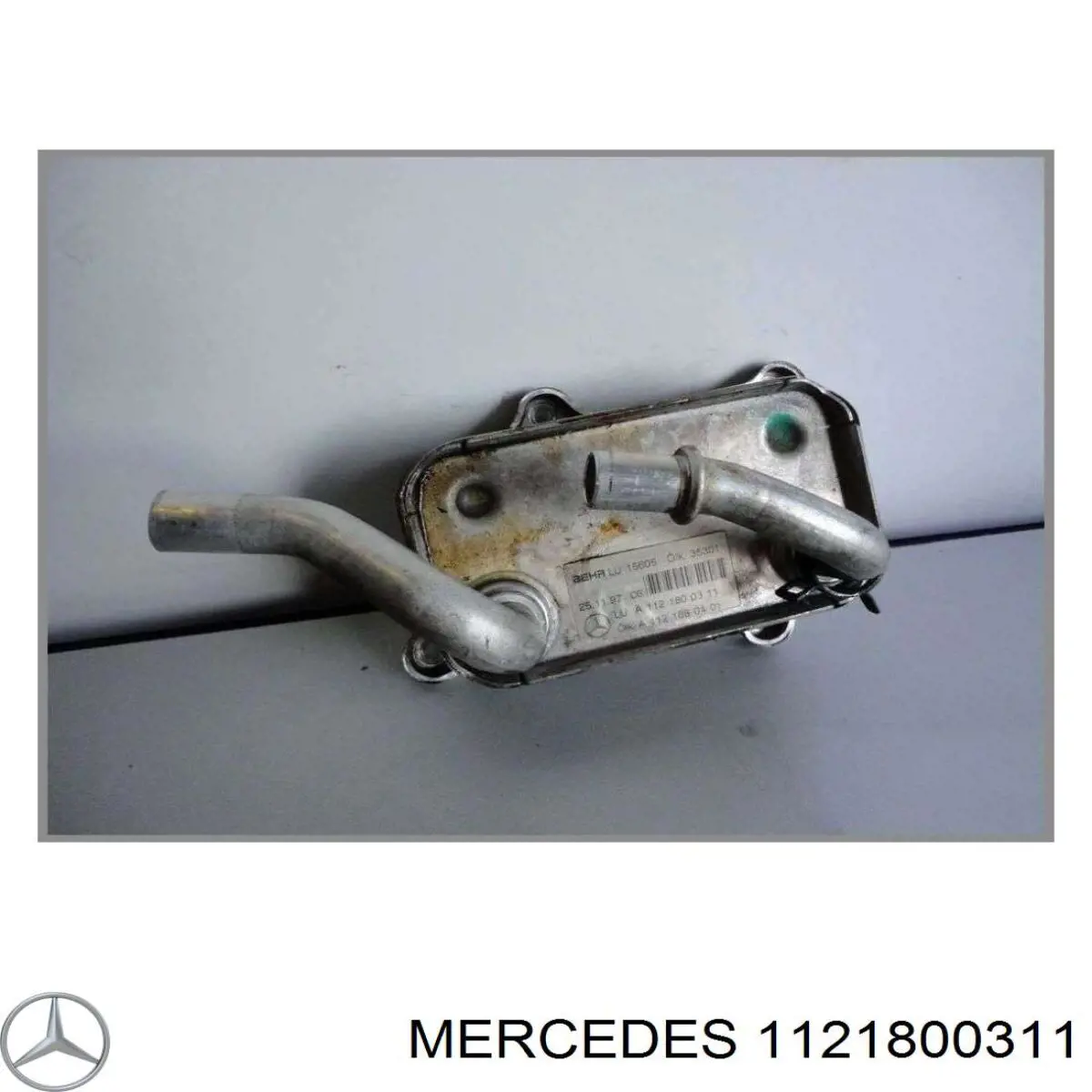 Масляный радиатор Mercedes 1121800311