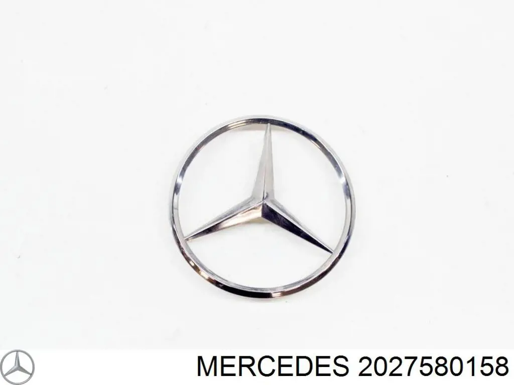 Фирменный значек на крышку багажника на Mercedes E (S210)