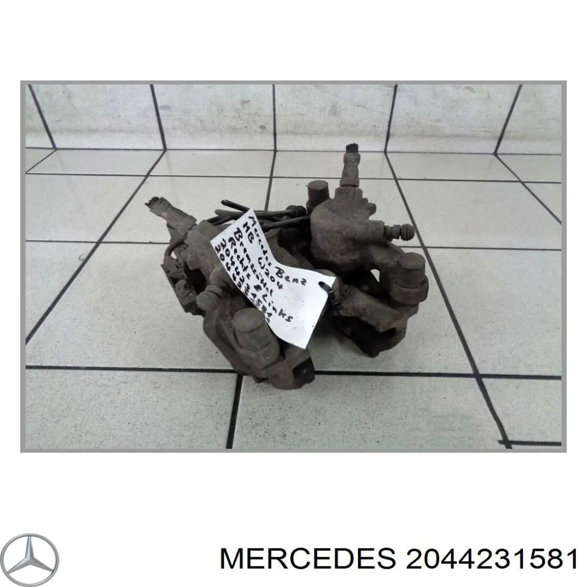 2044231581 Mercedes суппорт тормозной задний левый