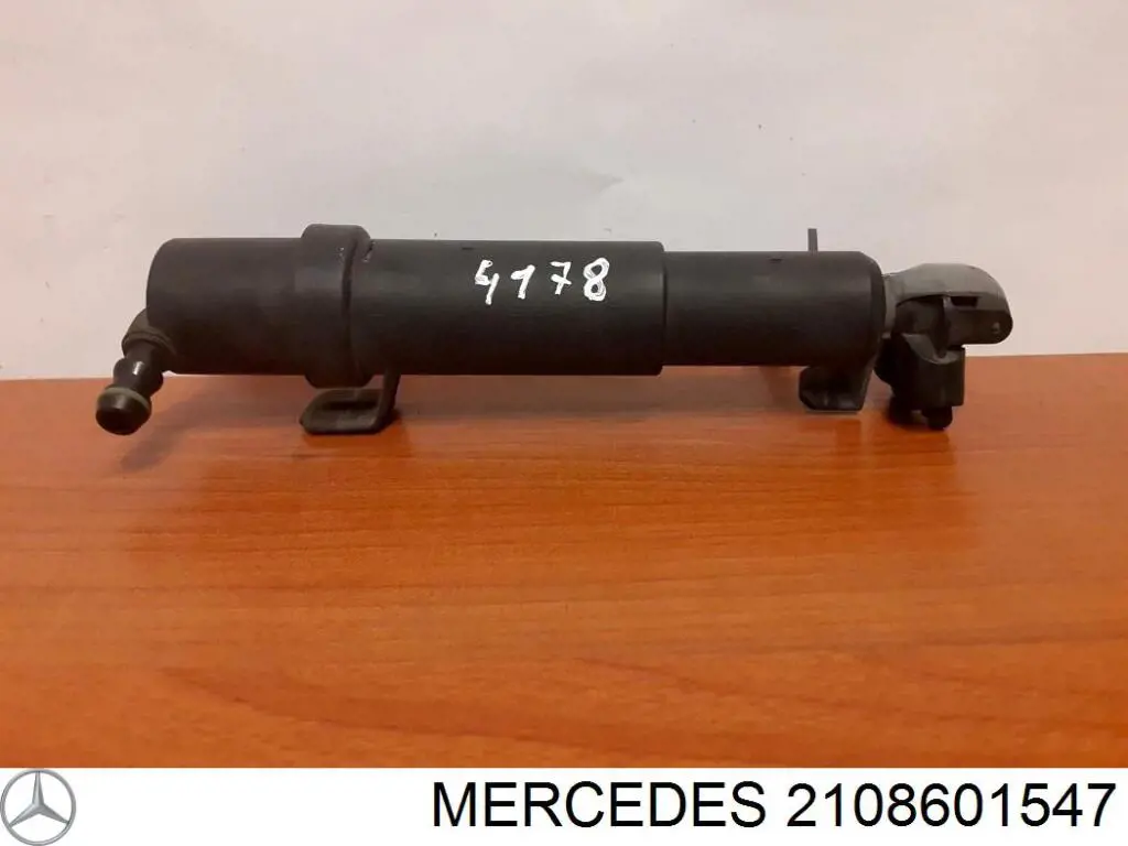 Форсунка омывателя фары передней левой 2108601547 Mercedes