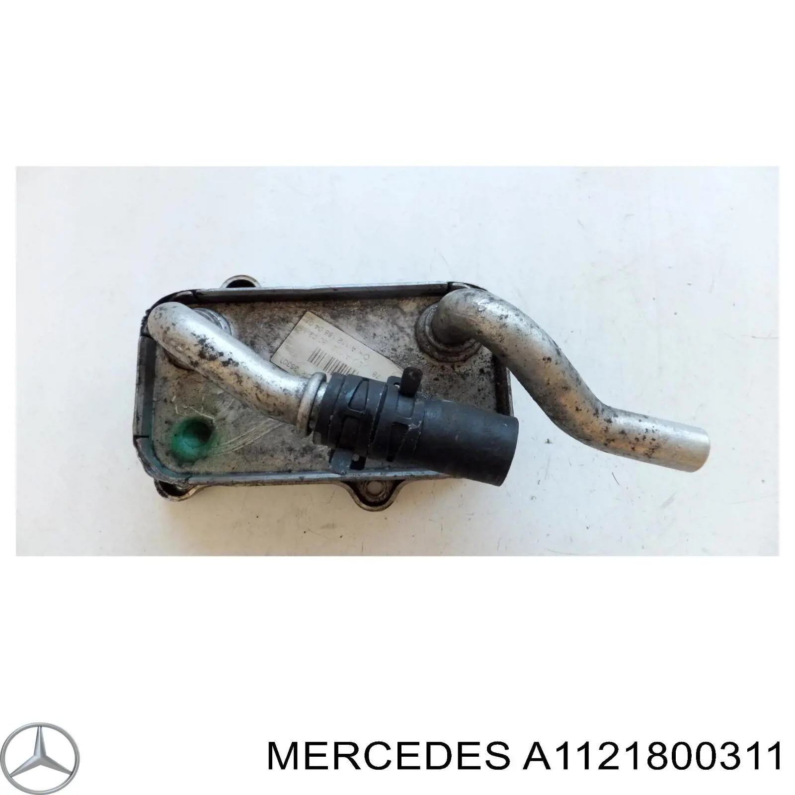 Масляный радиатор Mercedes A1121800311