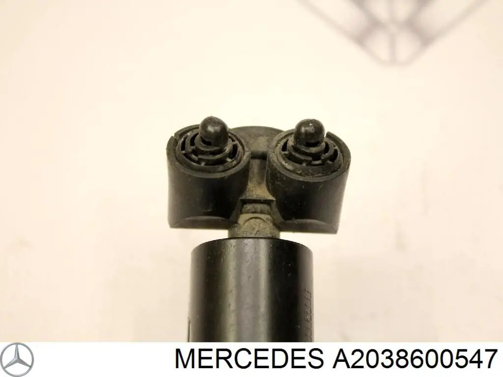 Купить A2038600547 Mercedes Форсунка омывателя фары передней левой
