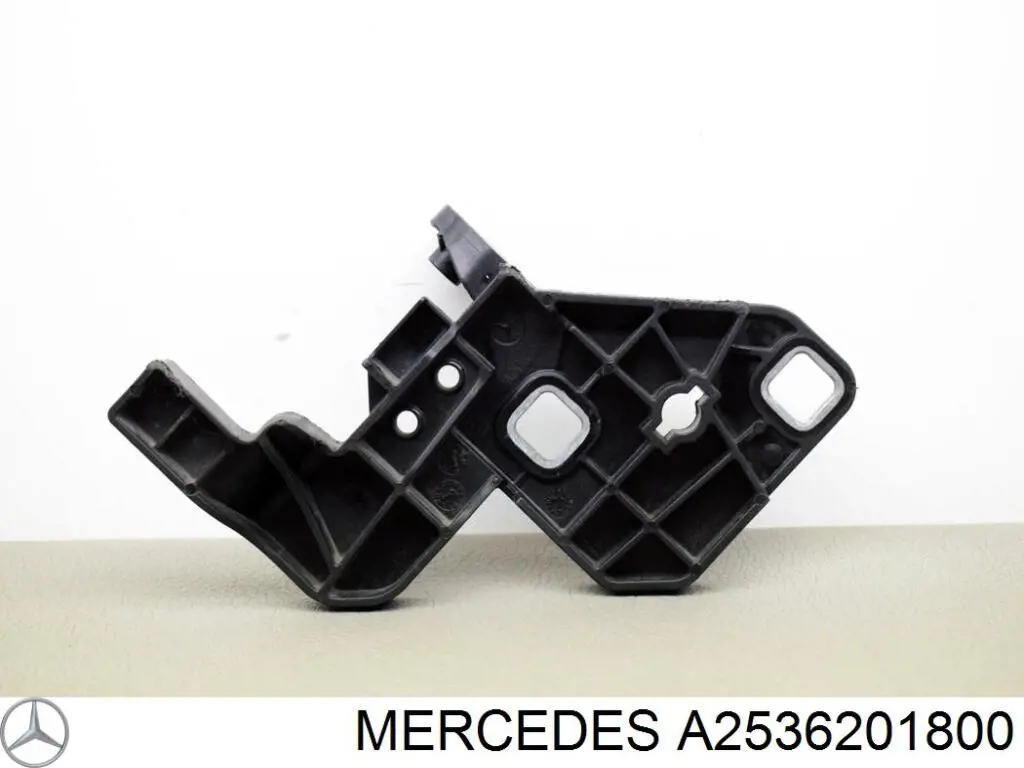 A2536201800 Mercedes consola (adaptador de fixação da luz dianteira direita)