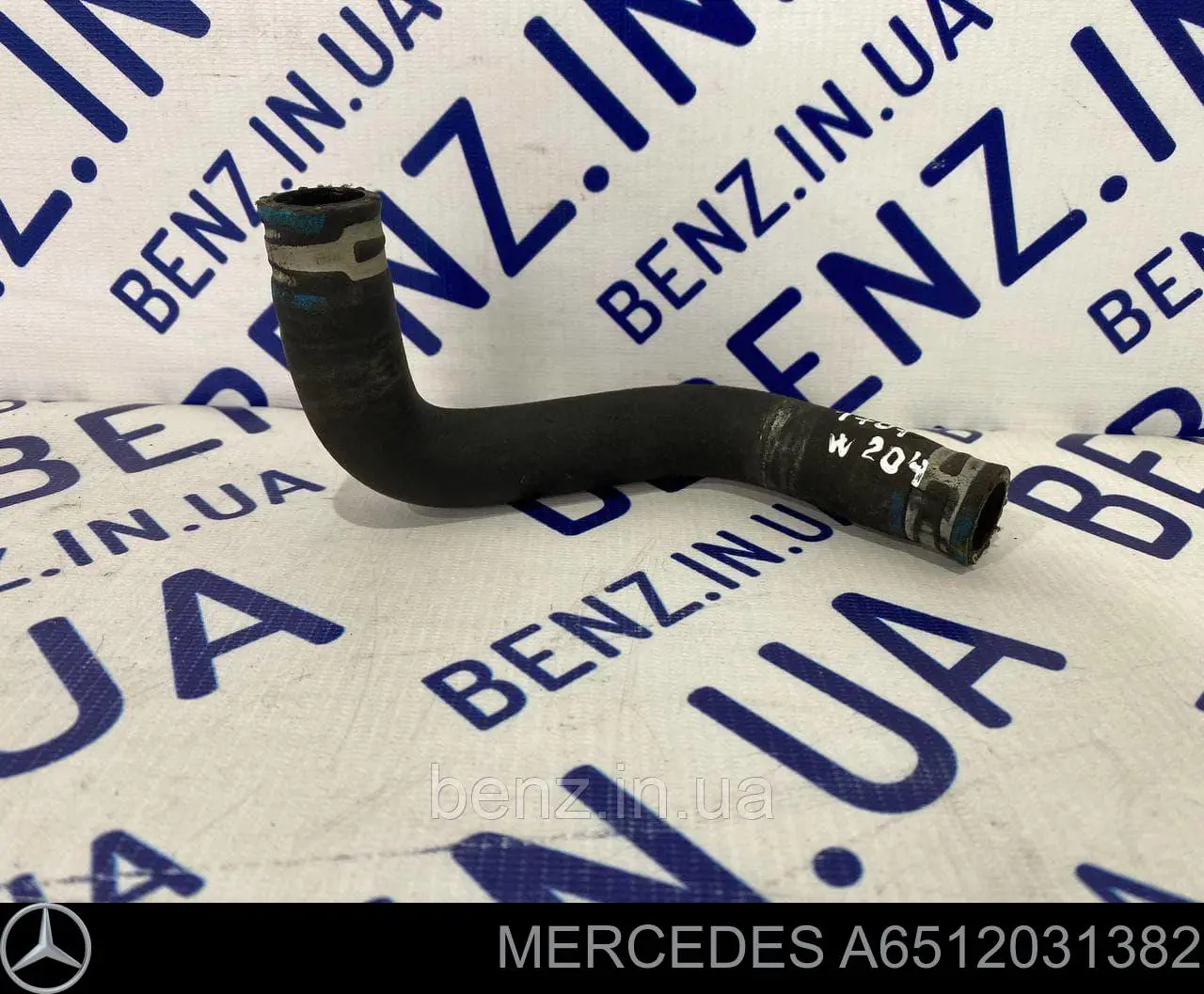 A6512031382 Mercedes шланг (патрубок охлаждения масляного теплообменника, обратка)