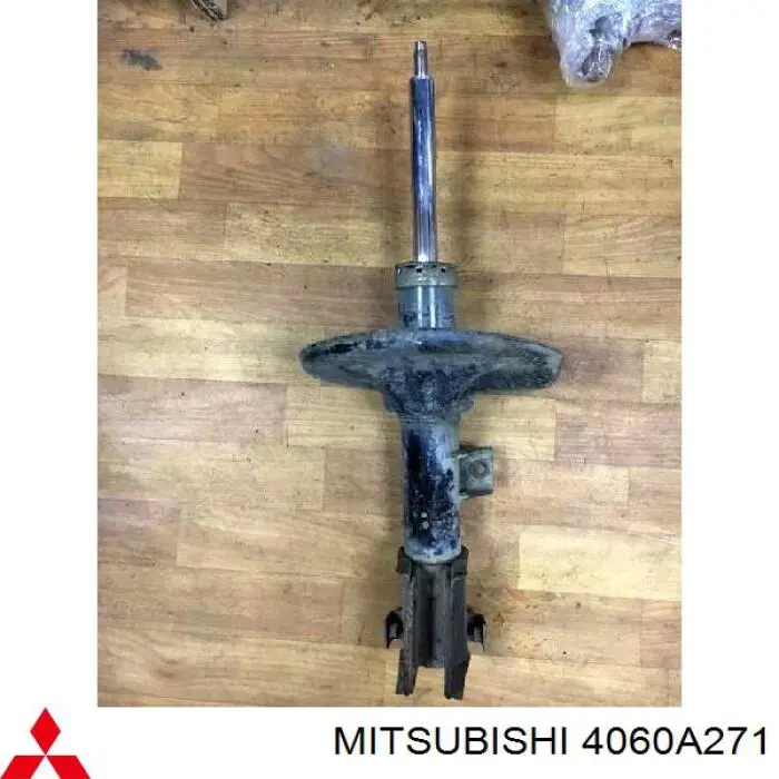 Амортизатор передний левый 4060A271 Mitsubishi