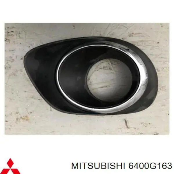 Заглушка (решетка) противотуманных фар бампера переднего левая Mitsubishi 6400G163