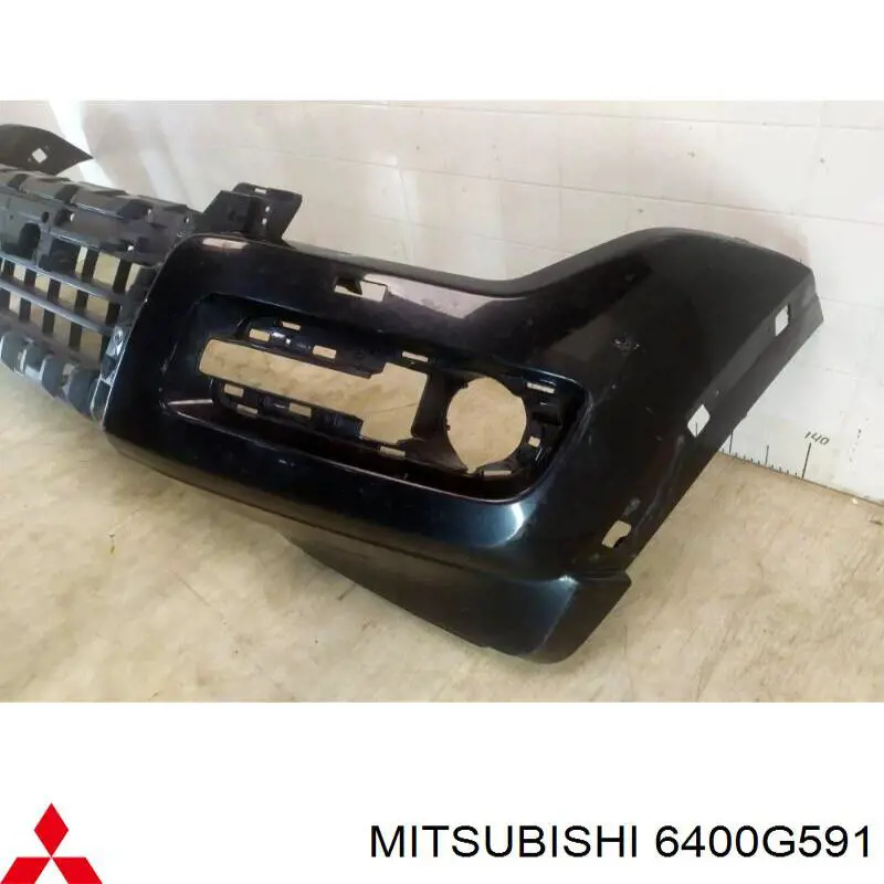 Передний бампер 6400G591 Mitsubishi