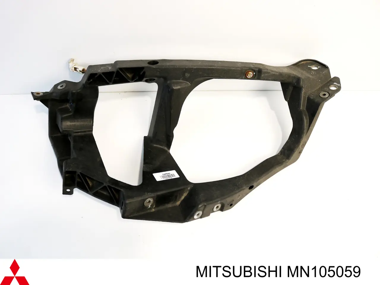 Consola (adaptador) de fixação da luz dianteira esquerda para Mitsubishi Colt (Z3A)