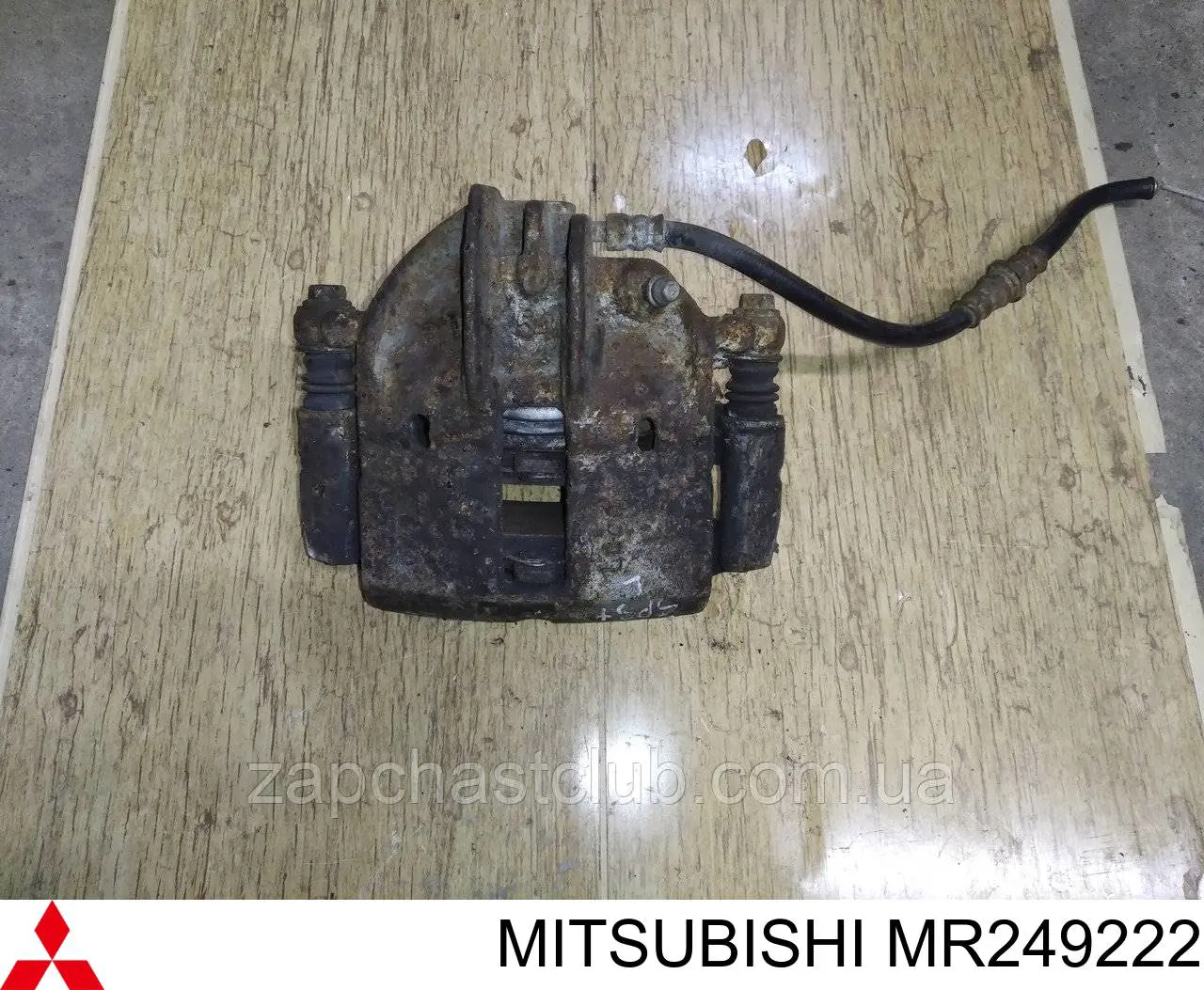 MR249222 Mitsubishi suporte do freio dianteiro esquerdo