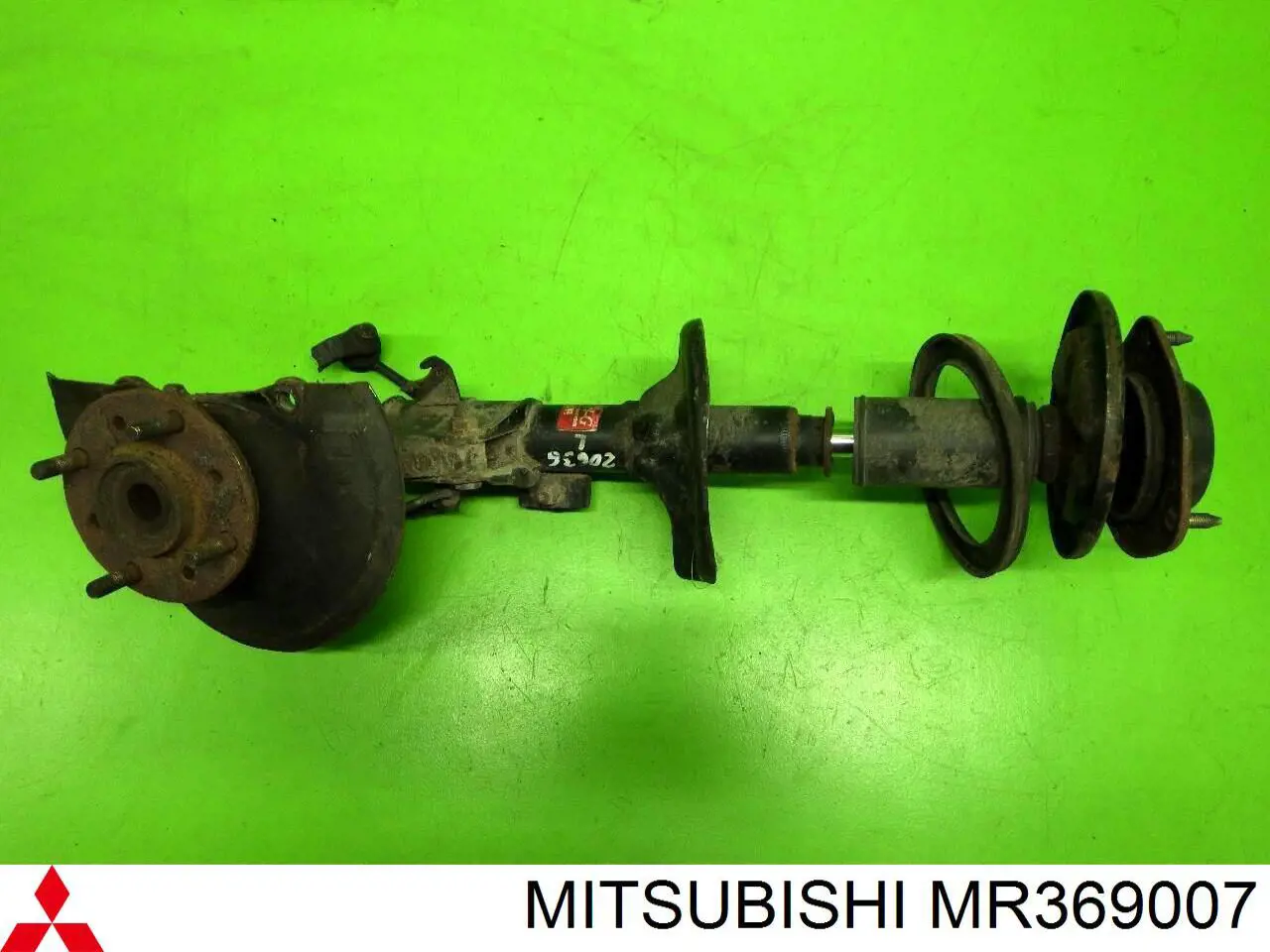 MR369007 Mitsubishi амортизатор передний левый