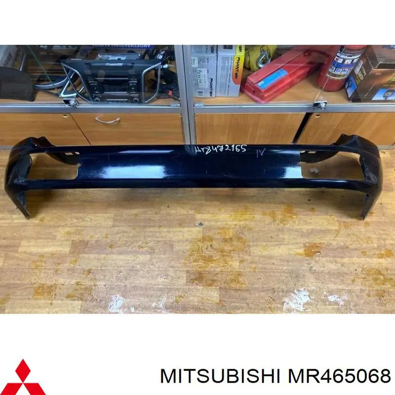 Бампер задний Mitsubishi Pajero SPORT (Митсубиси Паджеро)