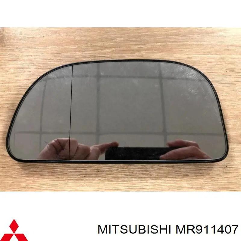 Зеркальный элемент левый MITSUBISHI MR911407