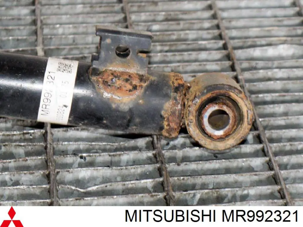 Купить MR992321 Mitsubishi Амортизатор передней подвески