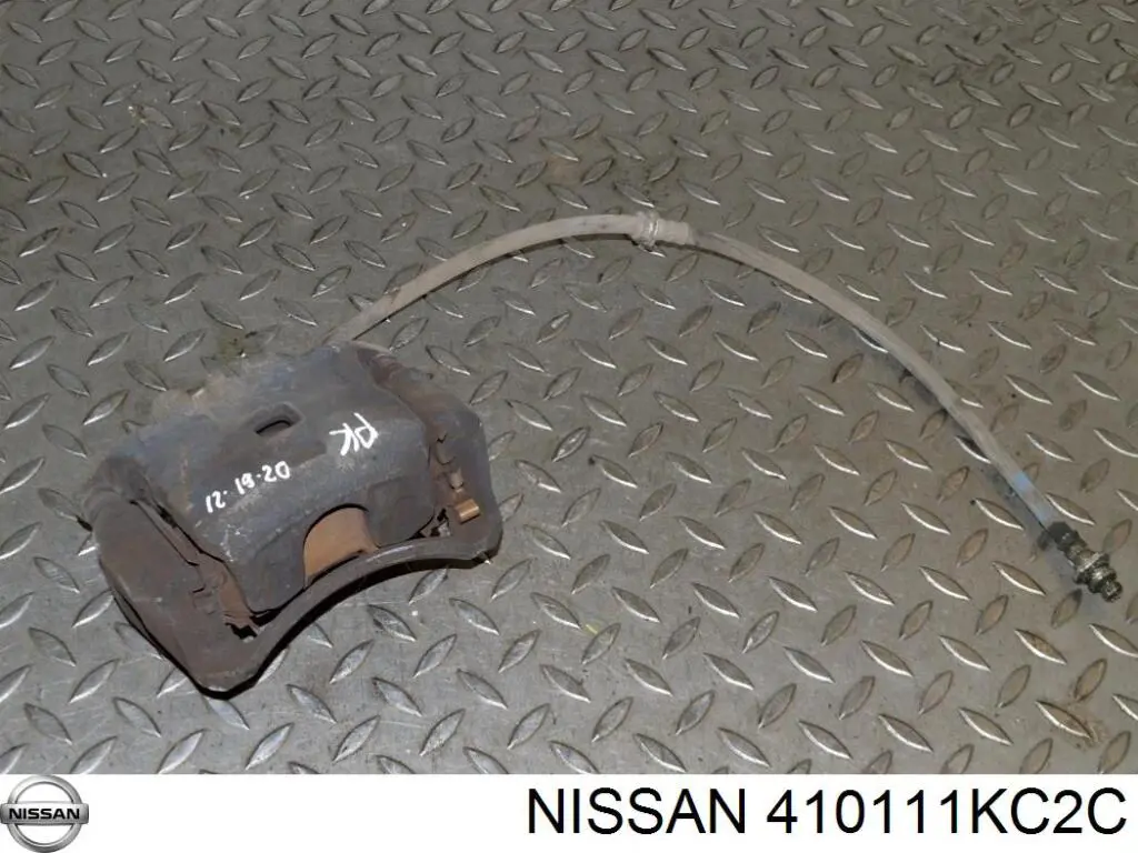 410111KC2C Nissan/Infiniti Суппорт тормозной, передний, левый
