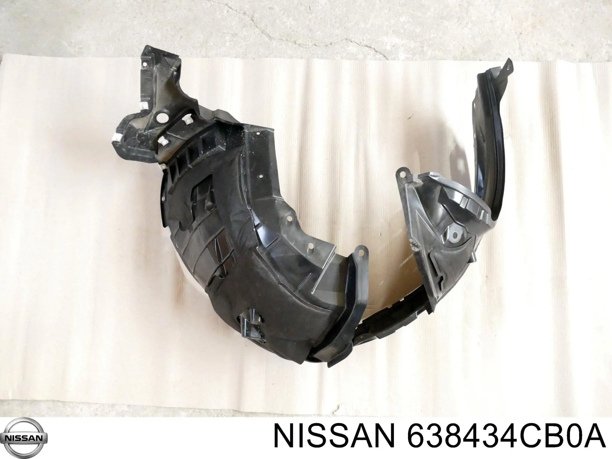 Подкрылок крыла переднего левый Nissan 638434CB0A