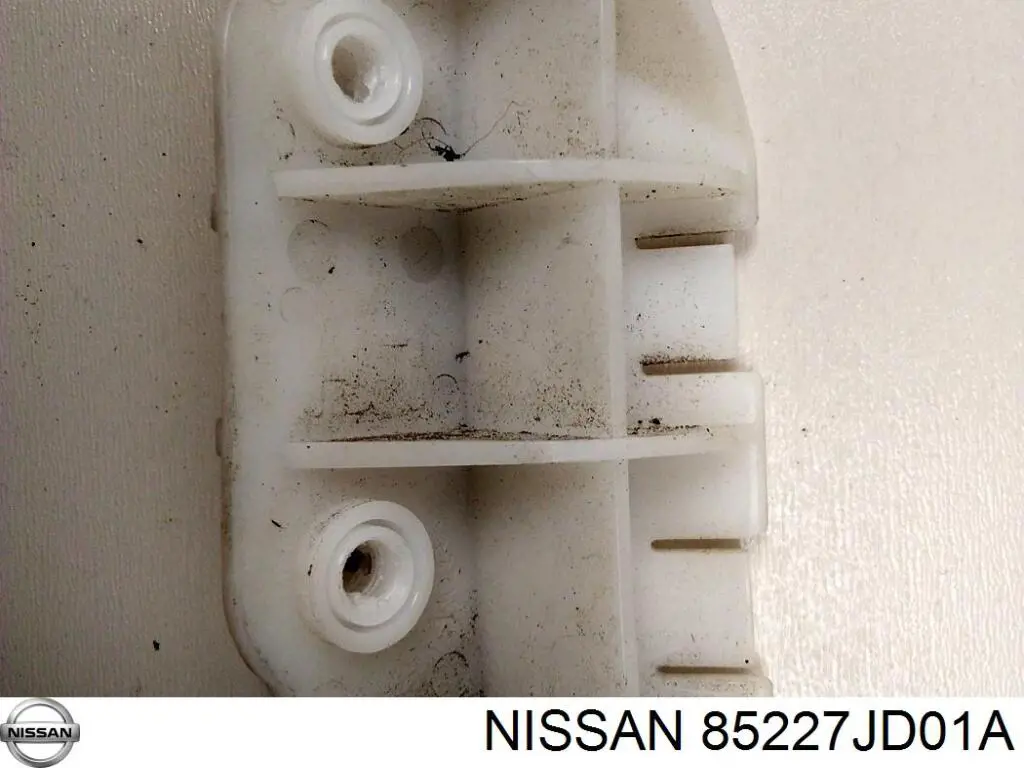 85227JD01A Nissan consola esquerda do pára-choque traseiro