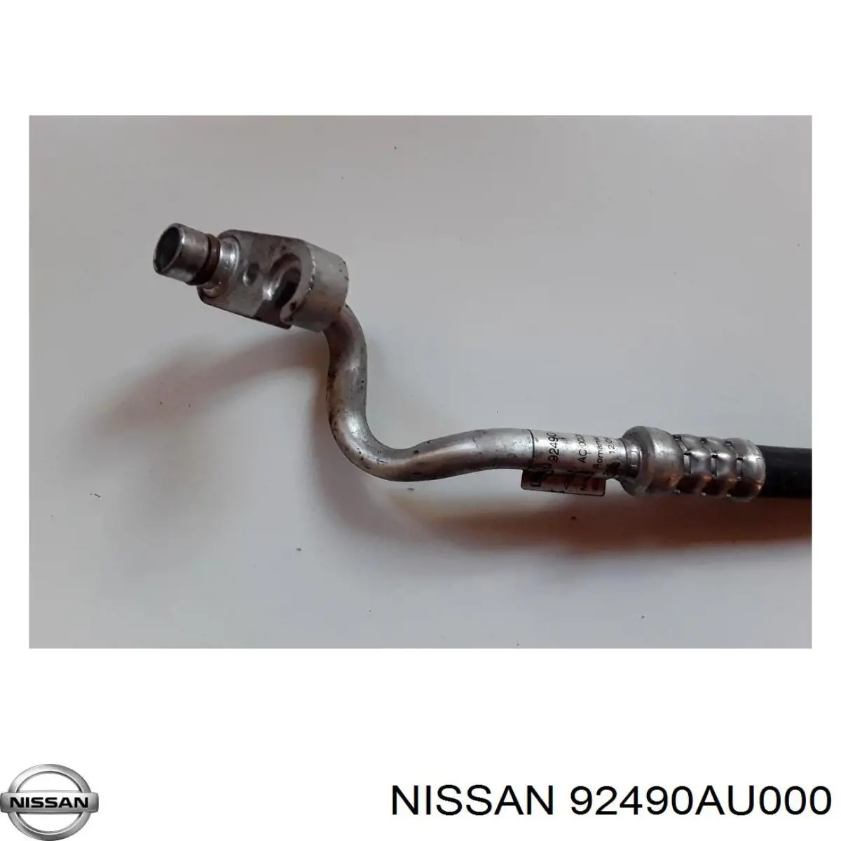 Купить 92490AU000 Nissan/Infiniti Шланг кондиционера, от компрессора к радиатору