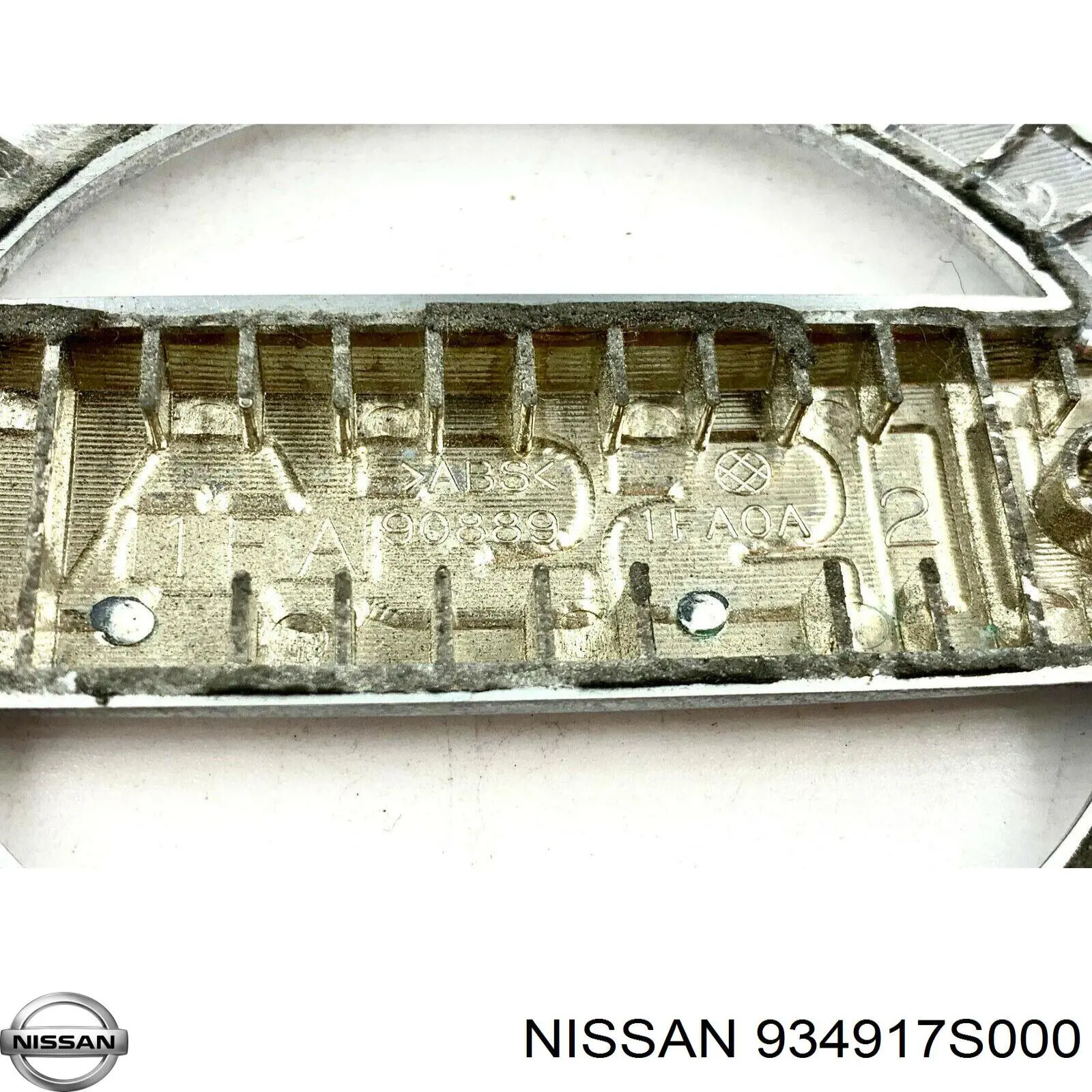 Эмблема крышки багажника 934917S000 Nissan/Infiniti