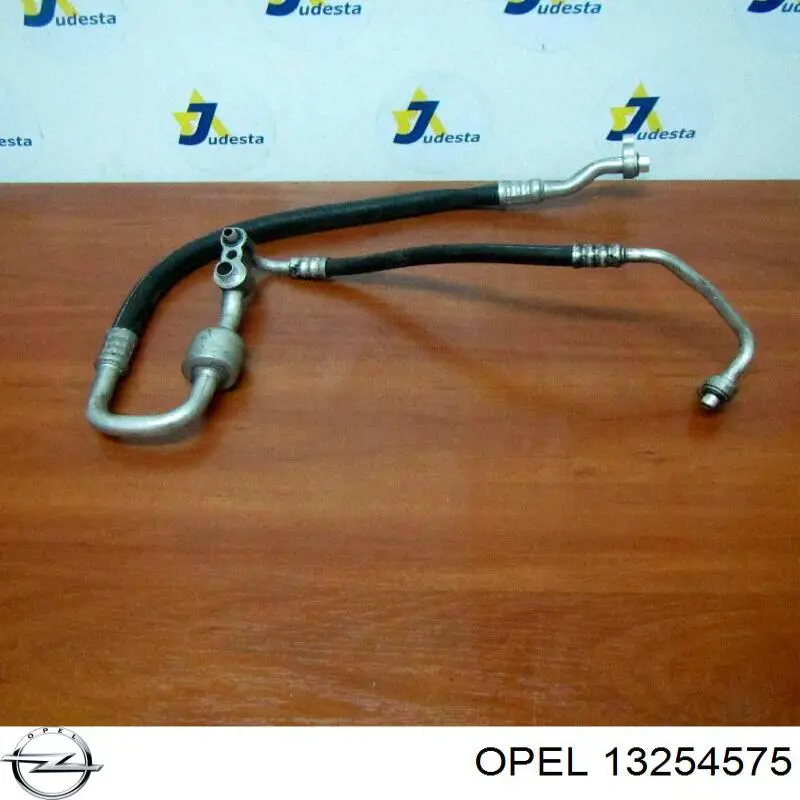 13254575 Opel Трубка кондиционера от компрессора к радиатору
