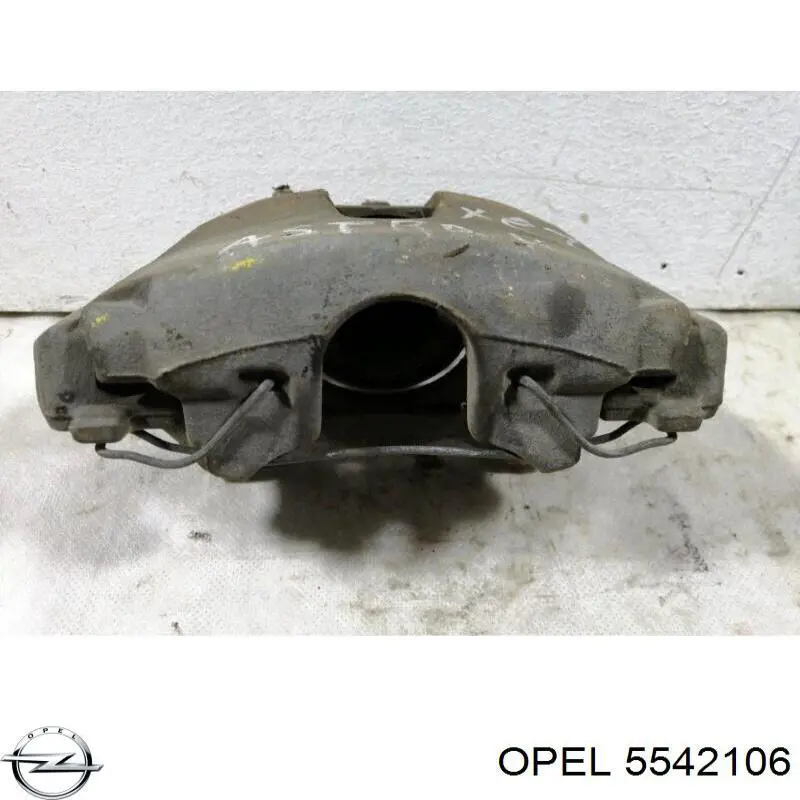 5542106 Opel суппорт тормозной передний левый