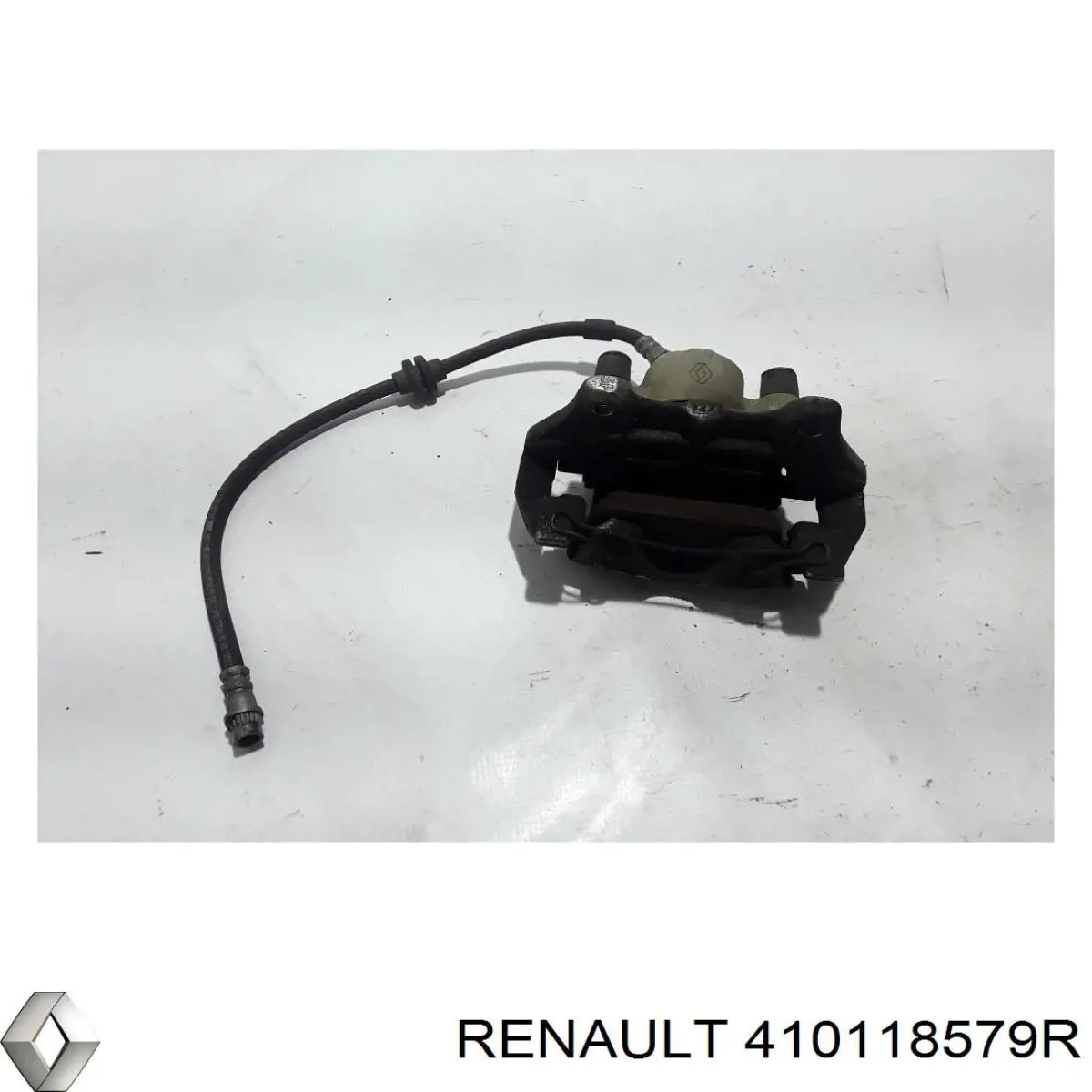 Купить 410118579R Renault (RVI) Суппорт тормозной передний левый