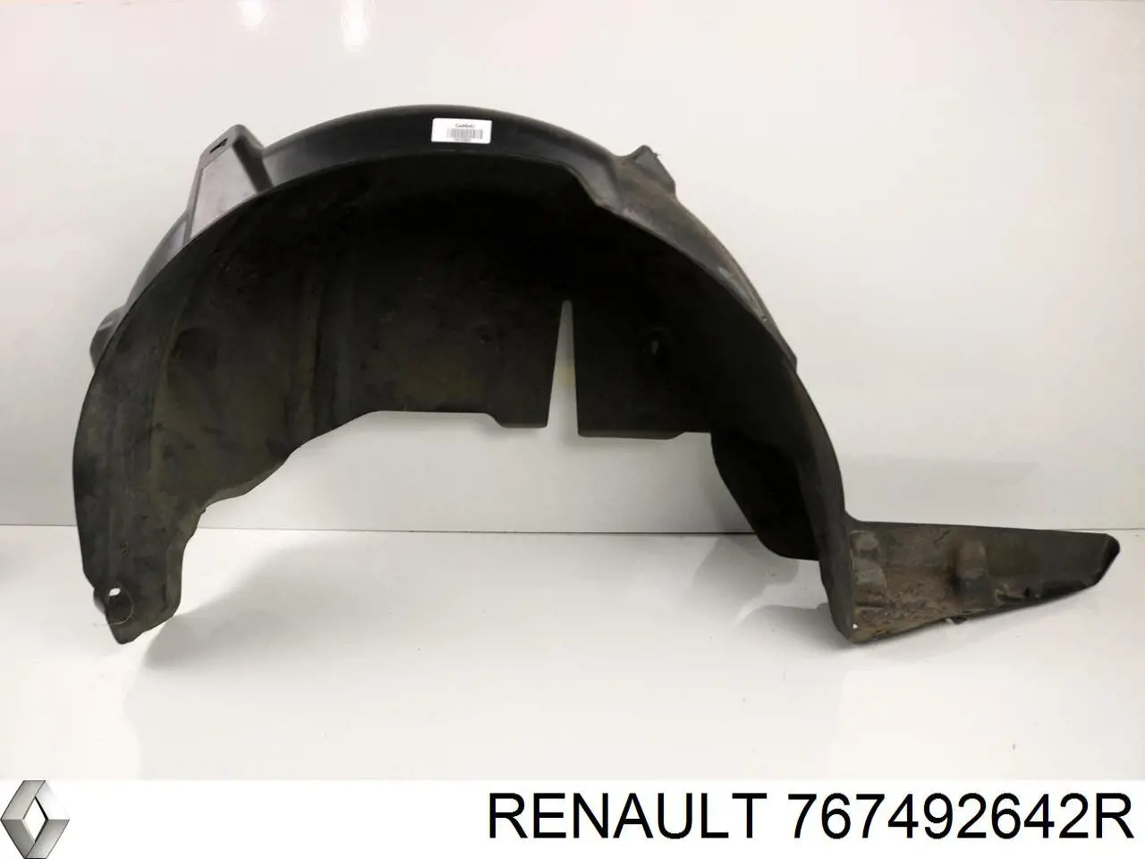 767490010R Renault (RVI) guarda-barras do pára-lama traseiro esquerdo