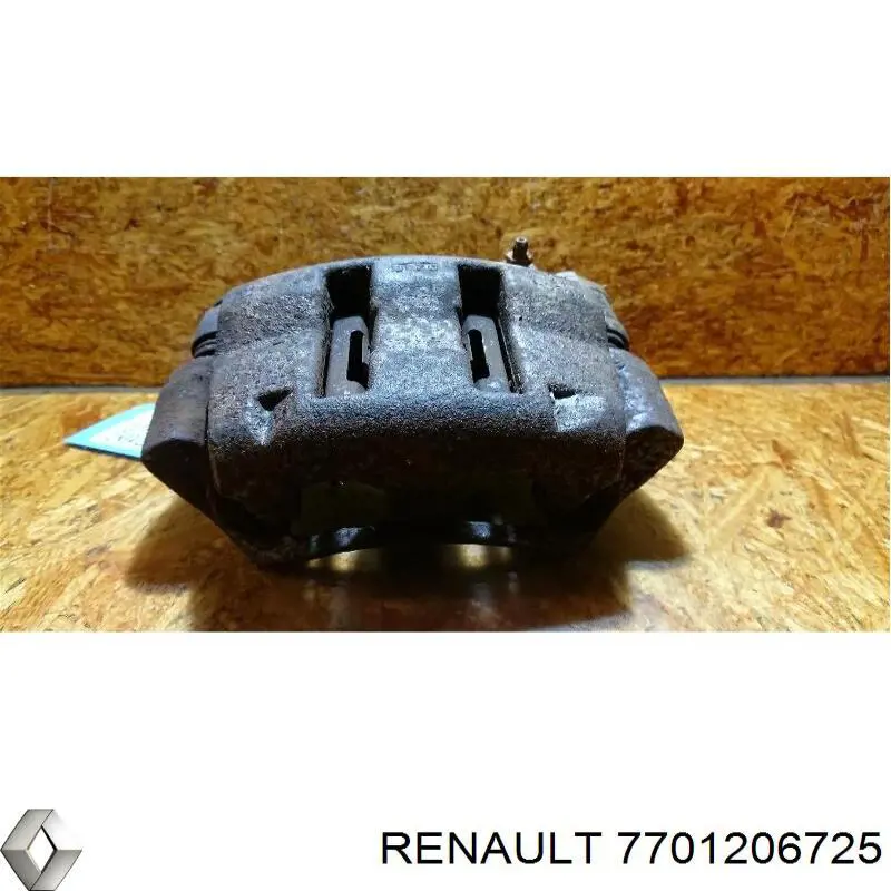 Суппорт тормозной передний левый 7701206725 Renault (RVI)