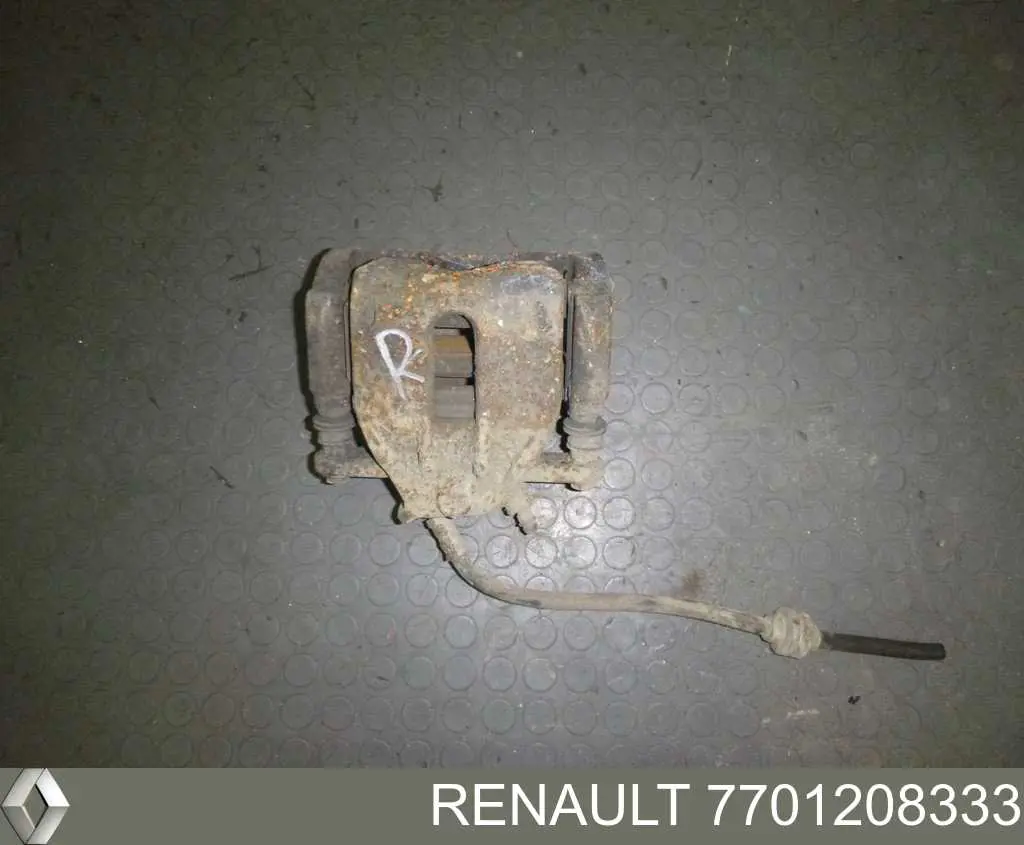 7701208333 Renault (RVI) suporte do freio dianteiro direito