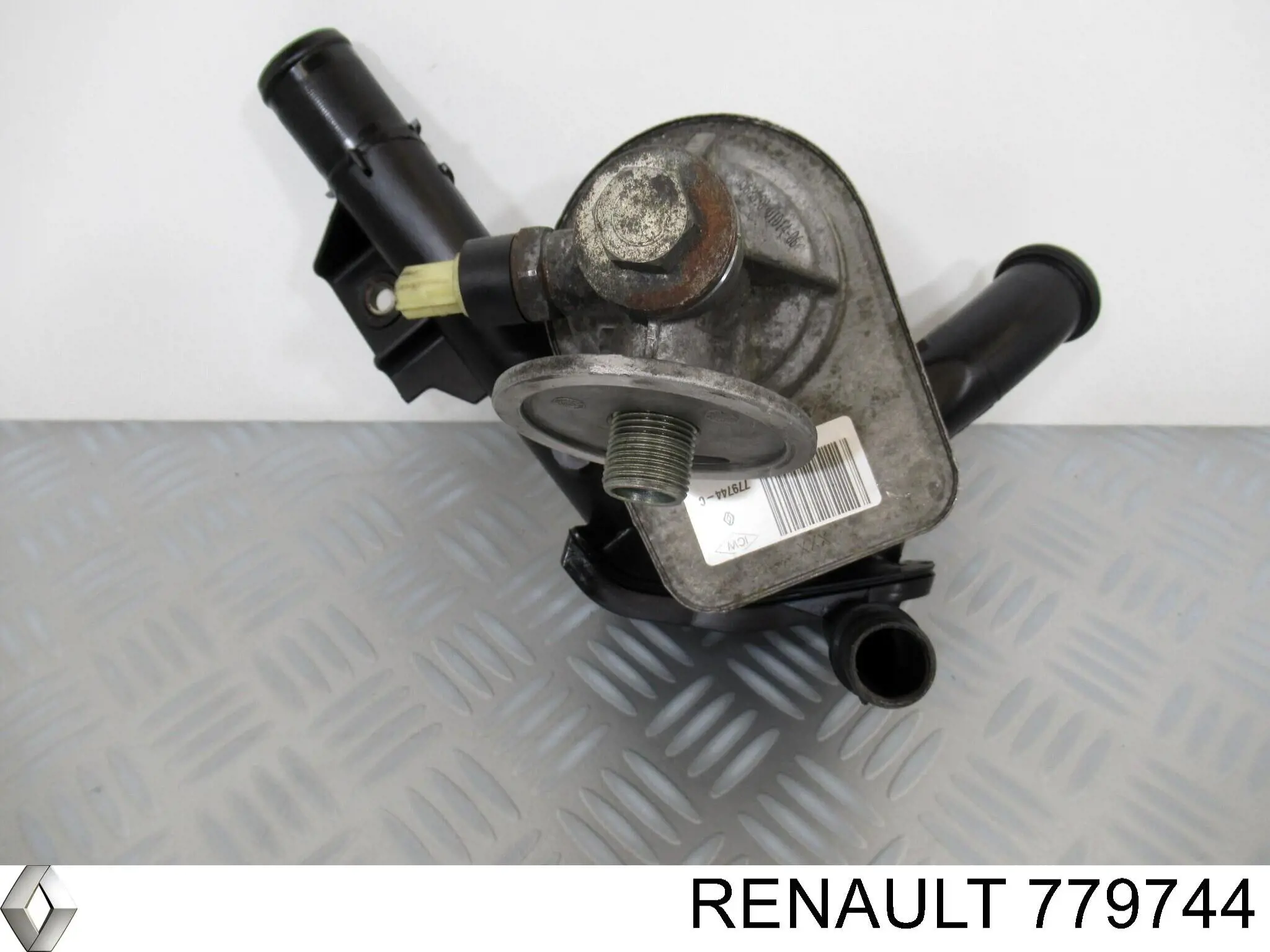 Радиатор масляный (холодильник), под фильтром 779744 Renault (RVI)