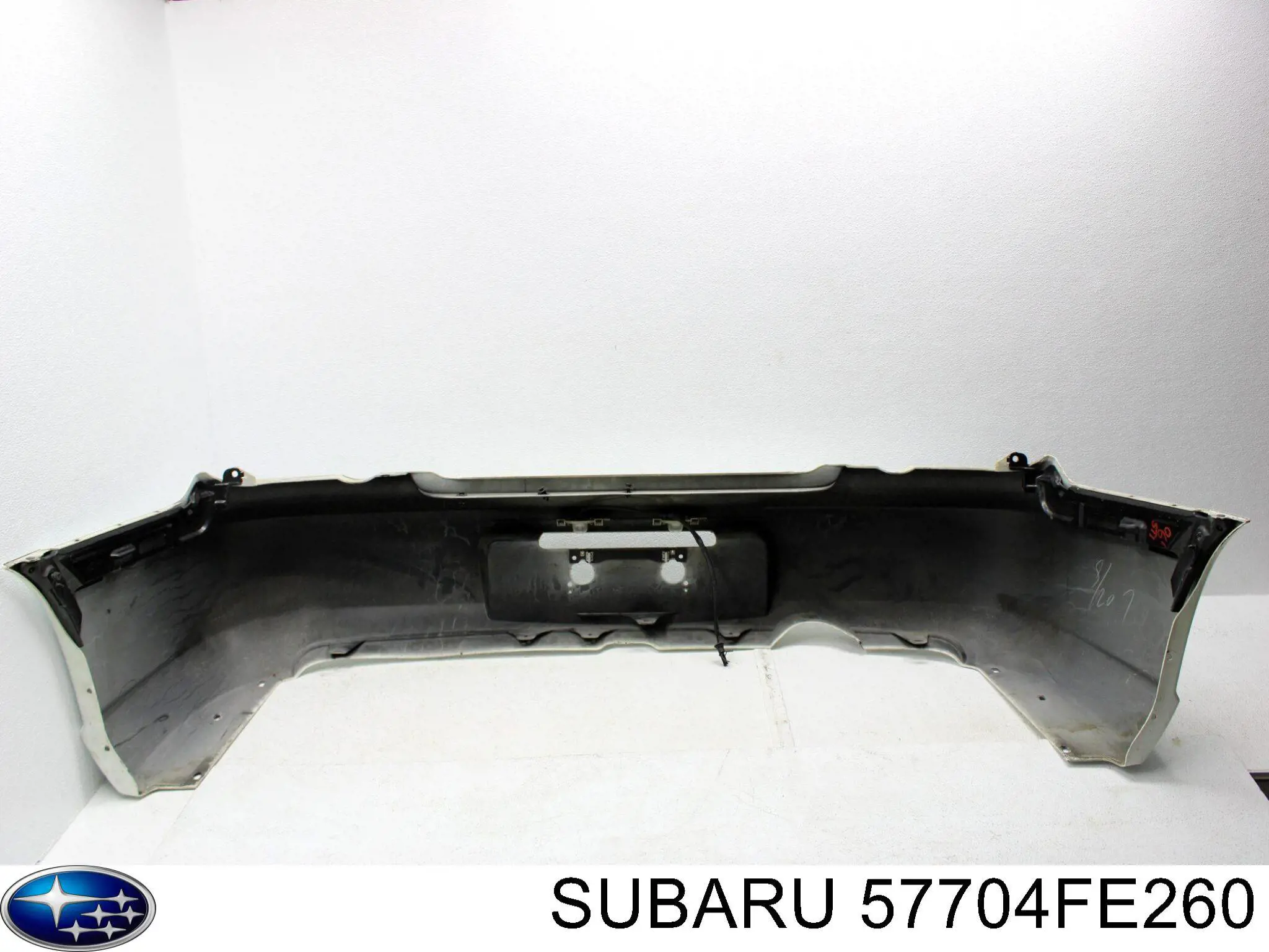 Бампер задний Subaru 57704FE260