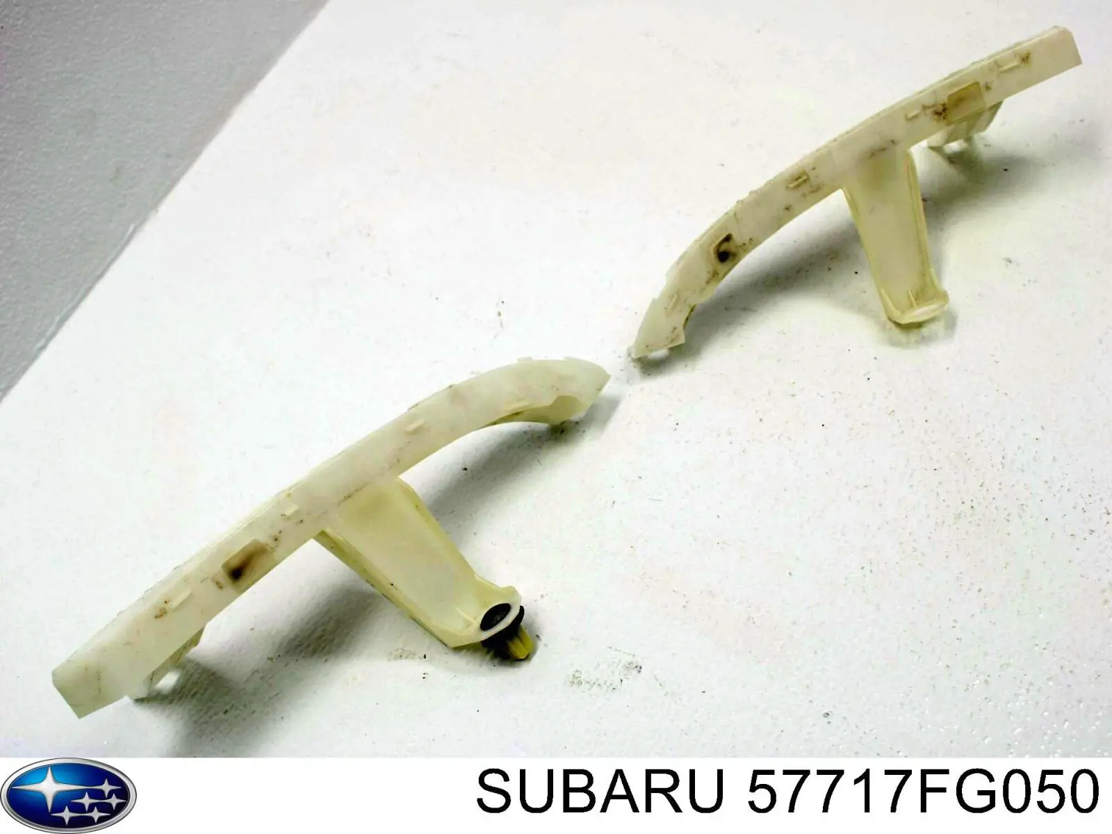 Купить 57717FG050 Subaru Правый кронштейн крепления бампера заднего